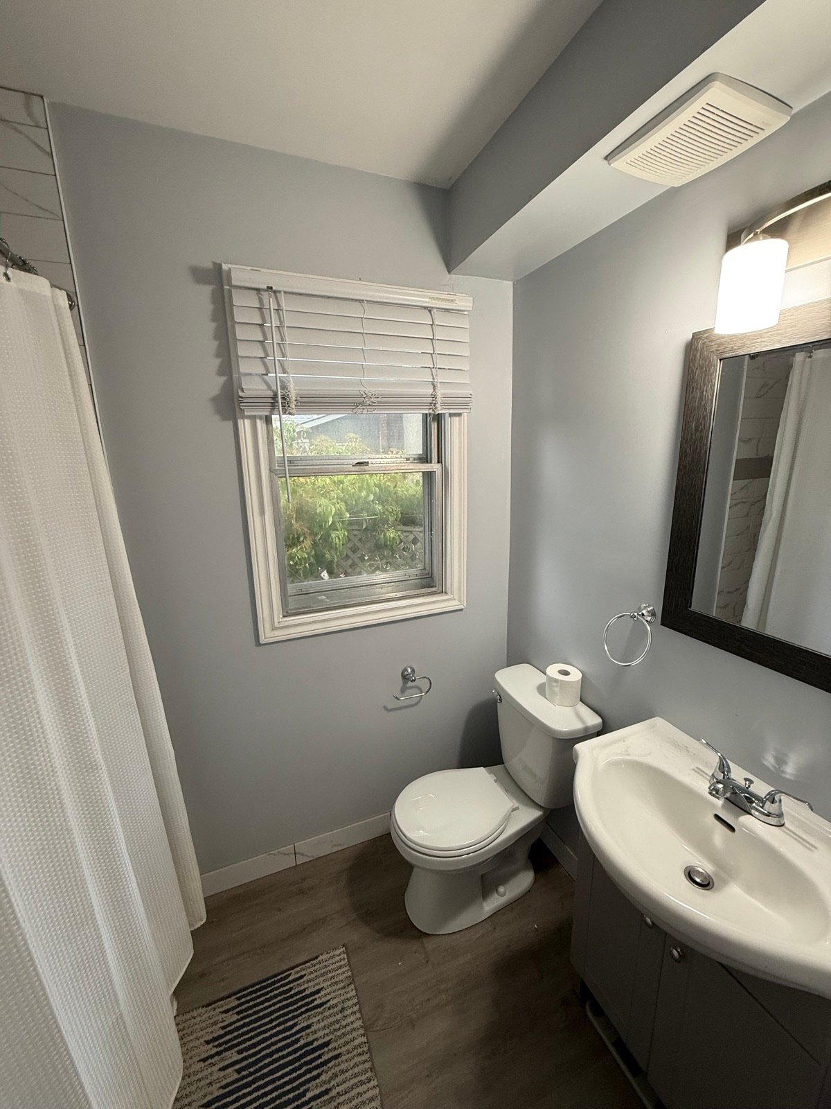 Bathroom before being repainted by The Hamilton Painting Company in Hamilton, Ontario